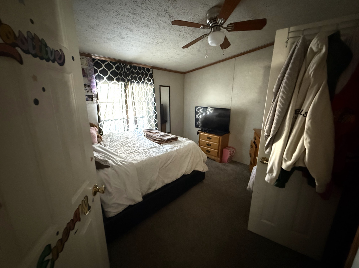 3404 Old Plank Road Park City, IL 60085 - Photo 15 of 20 a bedroom with bed and a window