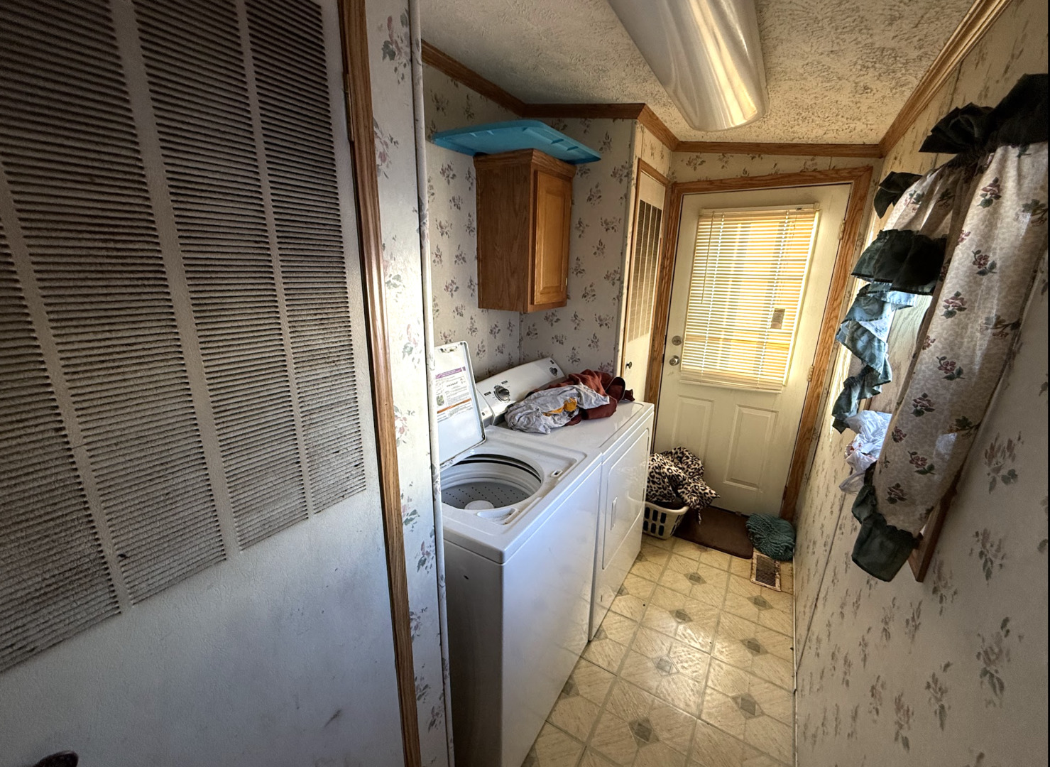 3404 Old Plank Road Park City, IL 60085 - Photo 17 of 20 a view of walk in closet with clothes and shoes