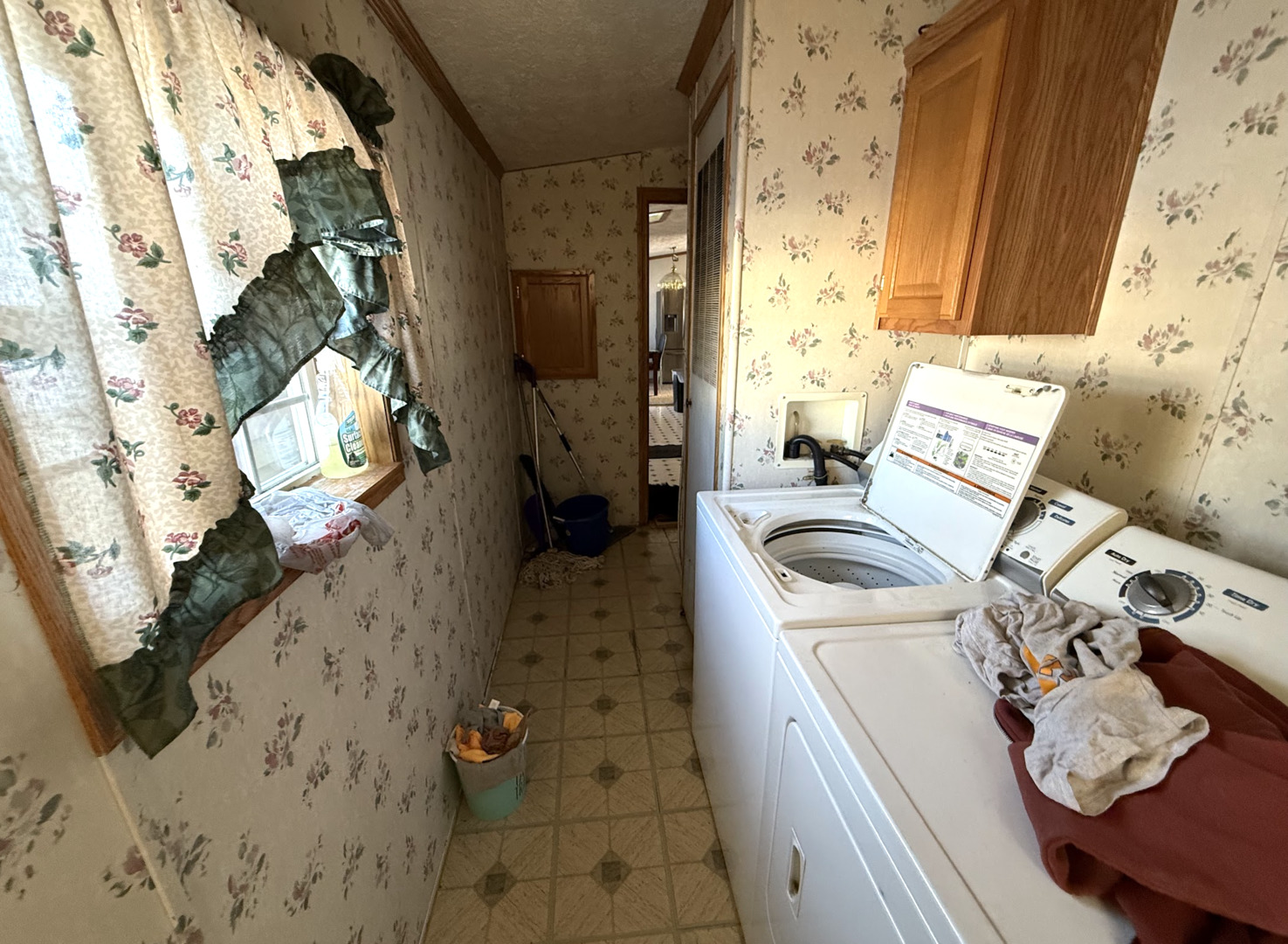 3404 Old Plank Road Park City, IL 60085 - Photo 18 of 20 a living room with furniture and a fireplace