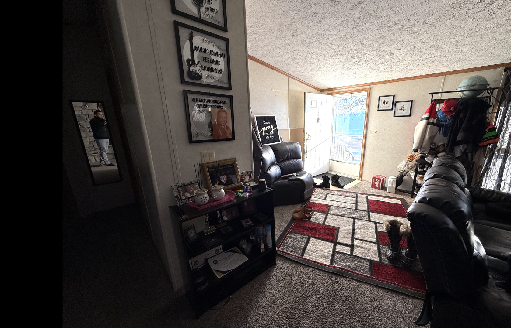 3404 Old Plank Road Park City, IL 60085 - Photo 4 of 20 a living room with furniture and a flat screen tv