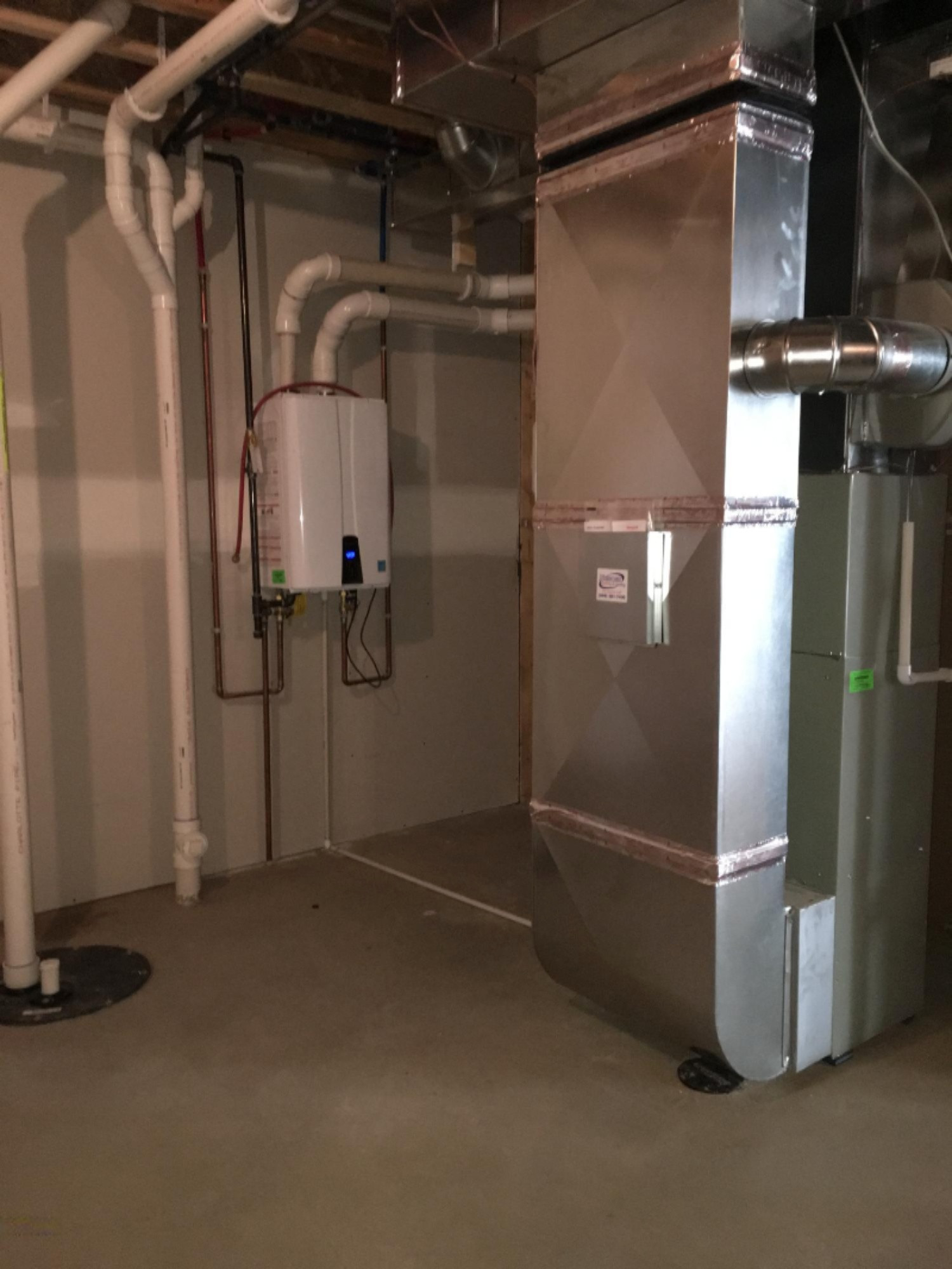 3412 Dunns Ridge, Unit 63 Kalamazoo, MI 49009 - Photo 22 of 33 WW-63 tankless water heater