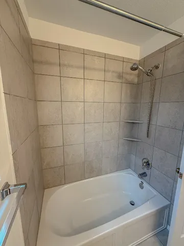 a bathroom with a sink vanity and a mirror