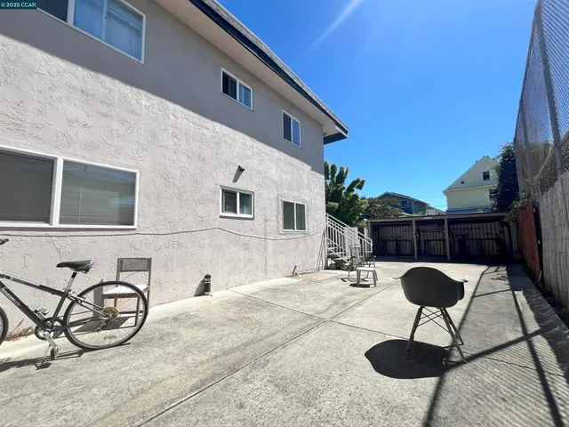 a view of balcony with furniture