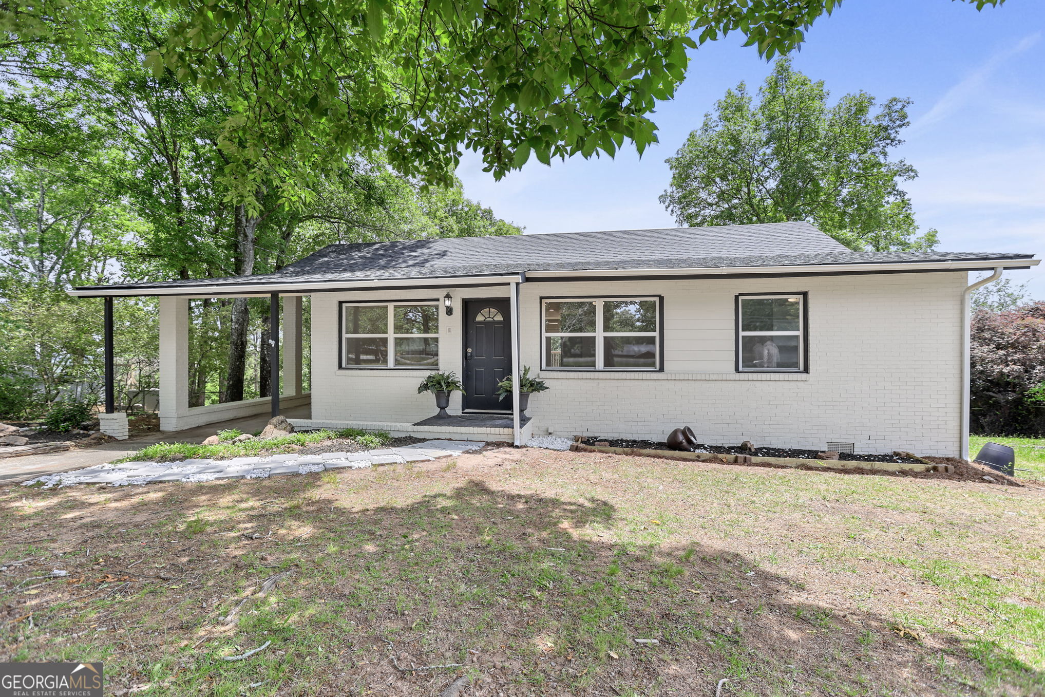7060 Scenic Heights Road Manchester, GA 31816 - Photo 1 of 52 a house with trees in the background