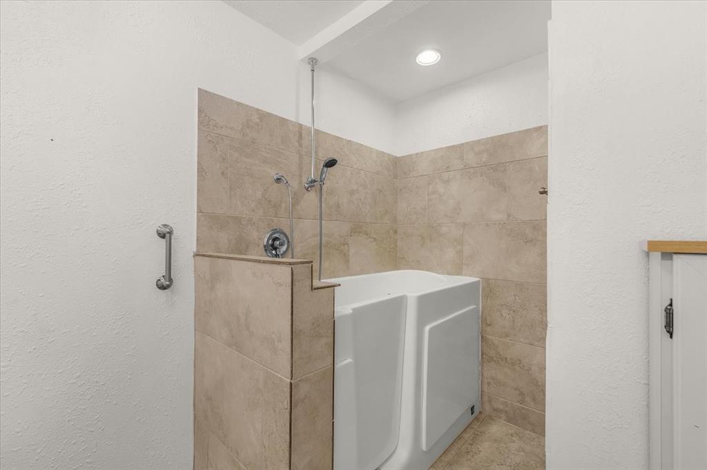 112 Del Rio Avenue, Unit A & B Benbrook, TX 76126 - Photo 17 of 33 a bathroom with a shower and a sink
