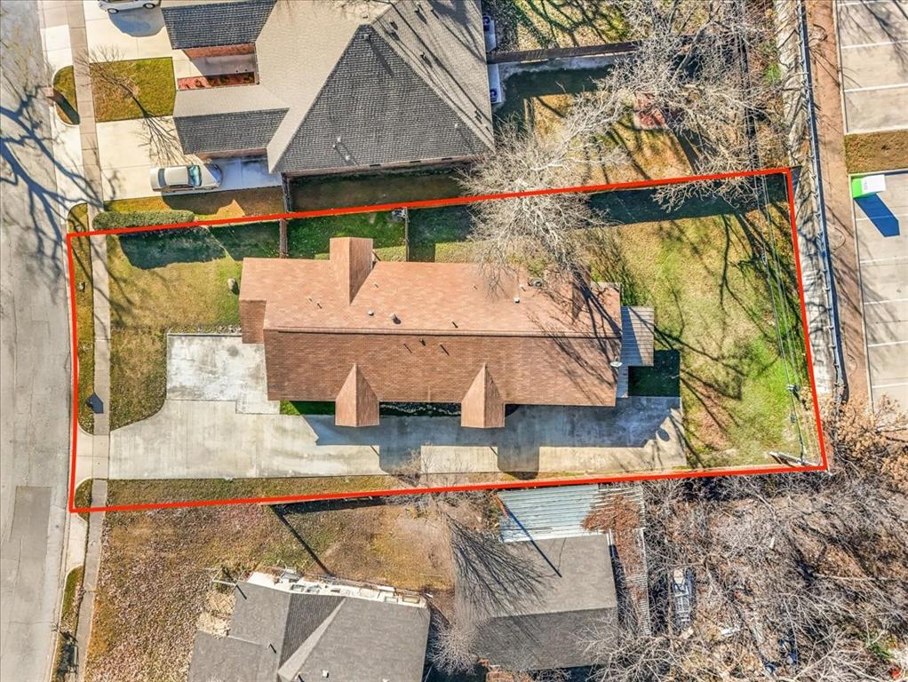 112 Del Rio Avenue, Unit A & B Benbrook, TX 76126 - Photo 27 of 33 an aerial view of a house with a yard