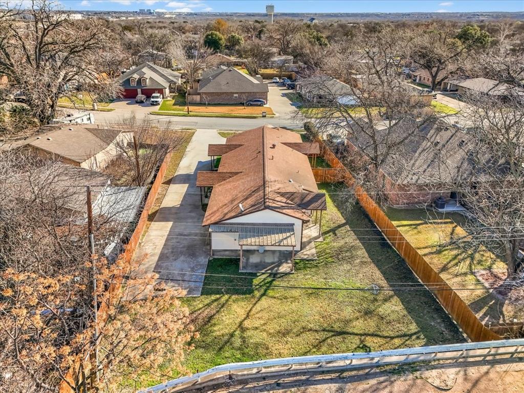112 Del Rio Avenue, Unit A & B Benbrook, TX 76126 - Photo 29 of 33 a view of residential houses with outdoor space