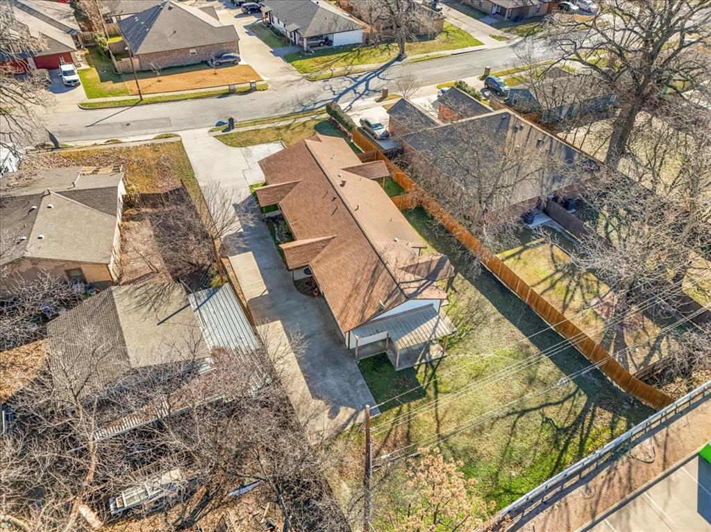 112 Del Rio Avenue, Unit A & B Benbrook, TX 76126 - Photo 30 of 33 with view of a house with a yard