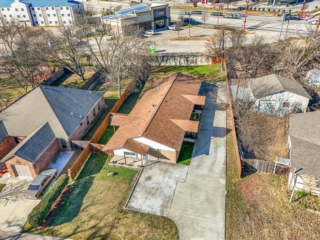 112 Del Rio Avenue, Unit A & B Benbrook, TX 76126 - Photo 31 of 33 an aerial view of a house with a yard basket ball court and outdoor seating