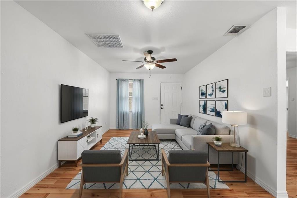 112 Del Rio Avenue, Unit A & B Benbrook, TX 76126 - Photo 8 of 33 a living room with furniture and a flat screen tv