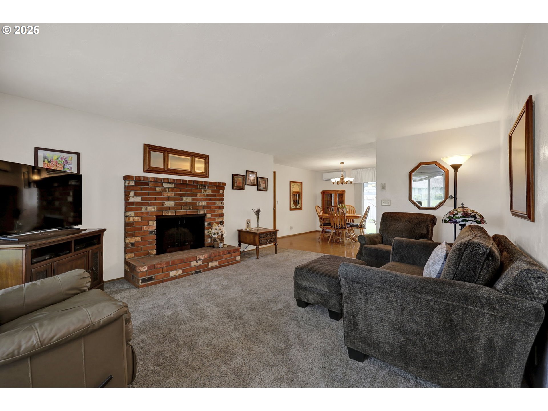 3670 Plumtree Drive Eugene, OR 97402 - Photo 14 of 47 a living room with furniture and a fireplace