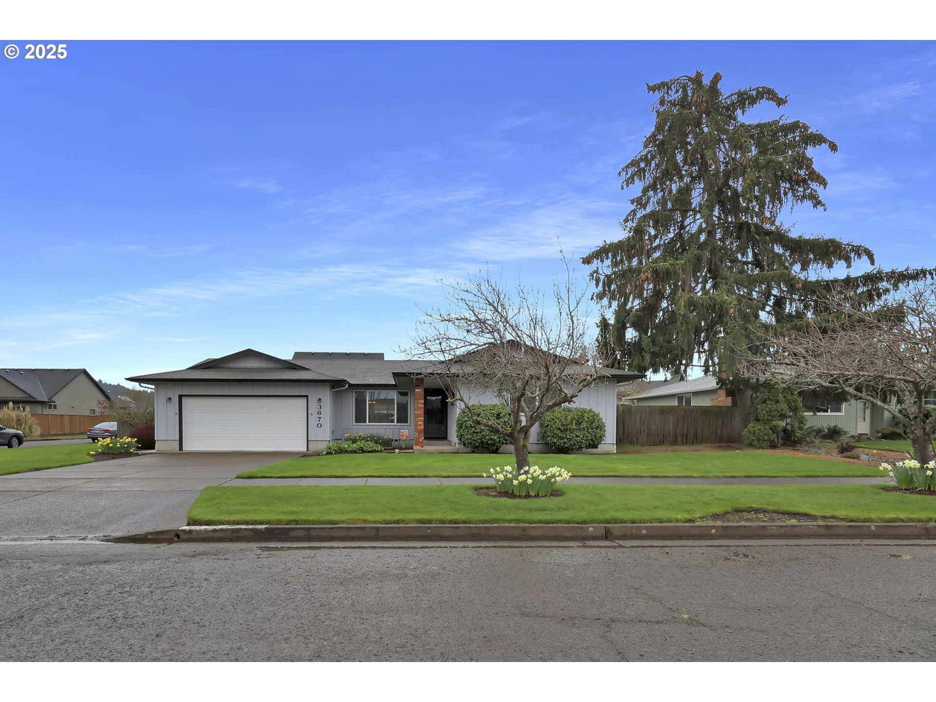 3670 Plumtree Drive Eugene, OR 97402 - Photo 2 of 47 a view of a big house with a big yard and potted plants