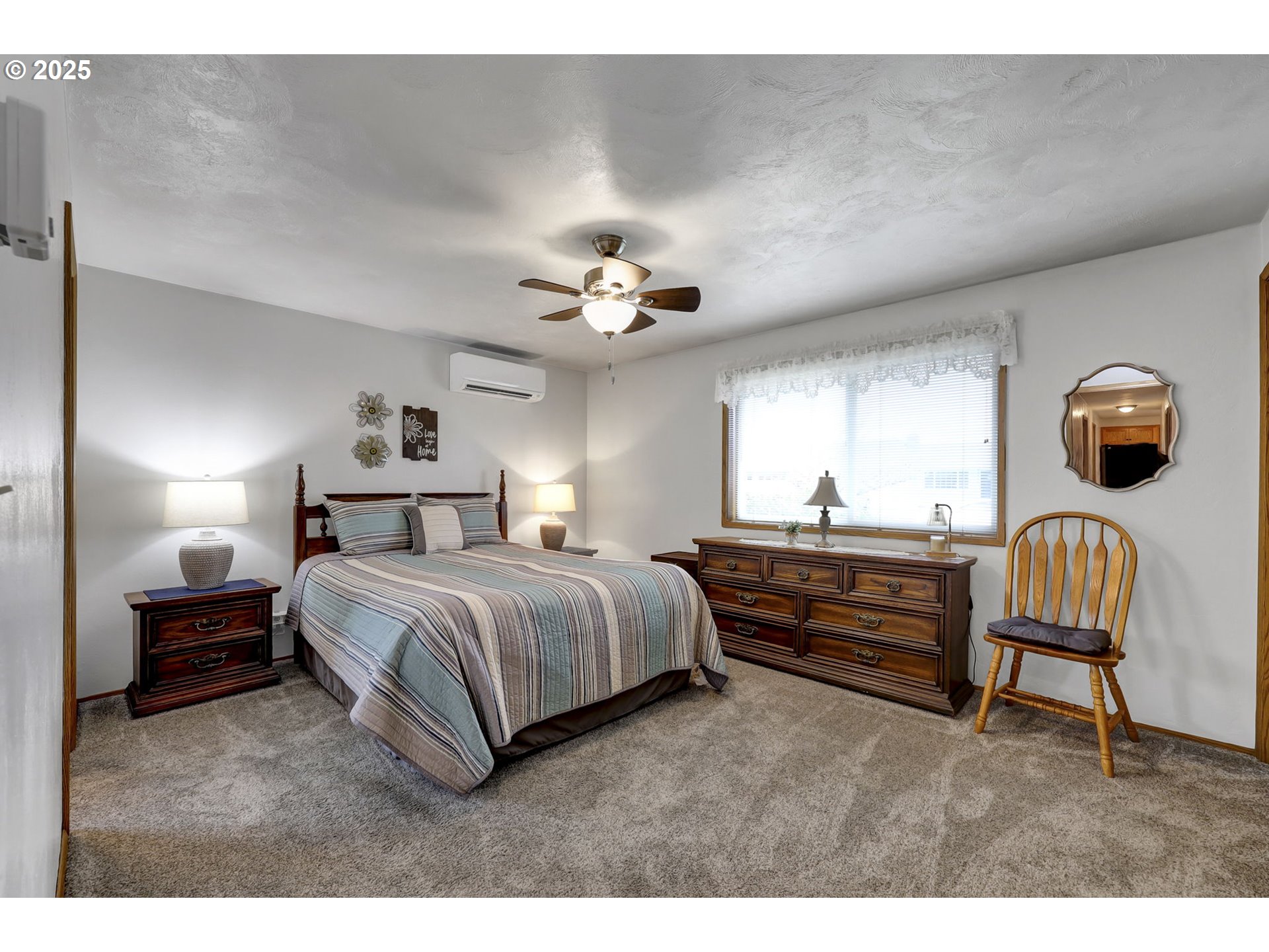 3670 Plumtree Drive Eugene, OR 97402 - Photo 25 of 47 a bedroom with a bed furniture and window