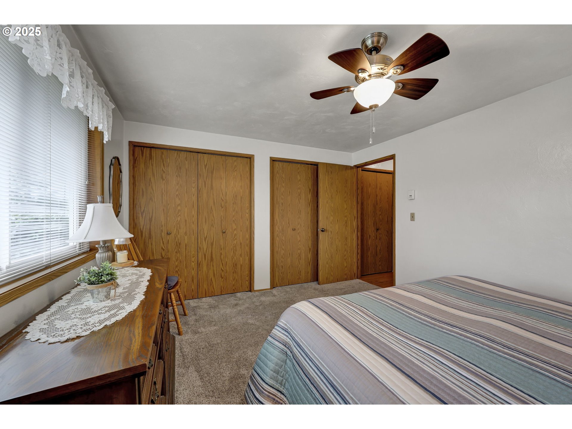 3670 Plumtree Drive Eugene, OR 97402 - Photo 26 of 47 a bedroom with a granite countertop sink and a large mirror