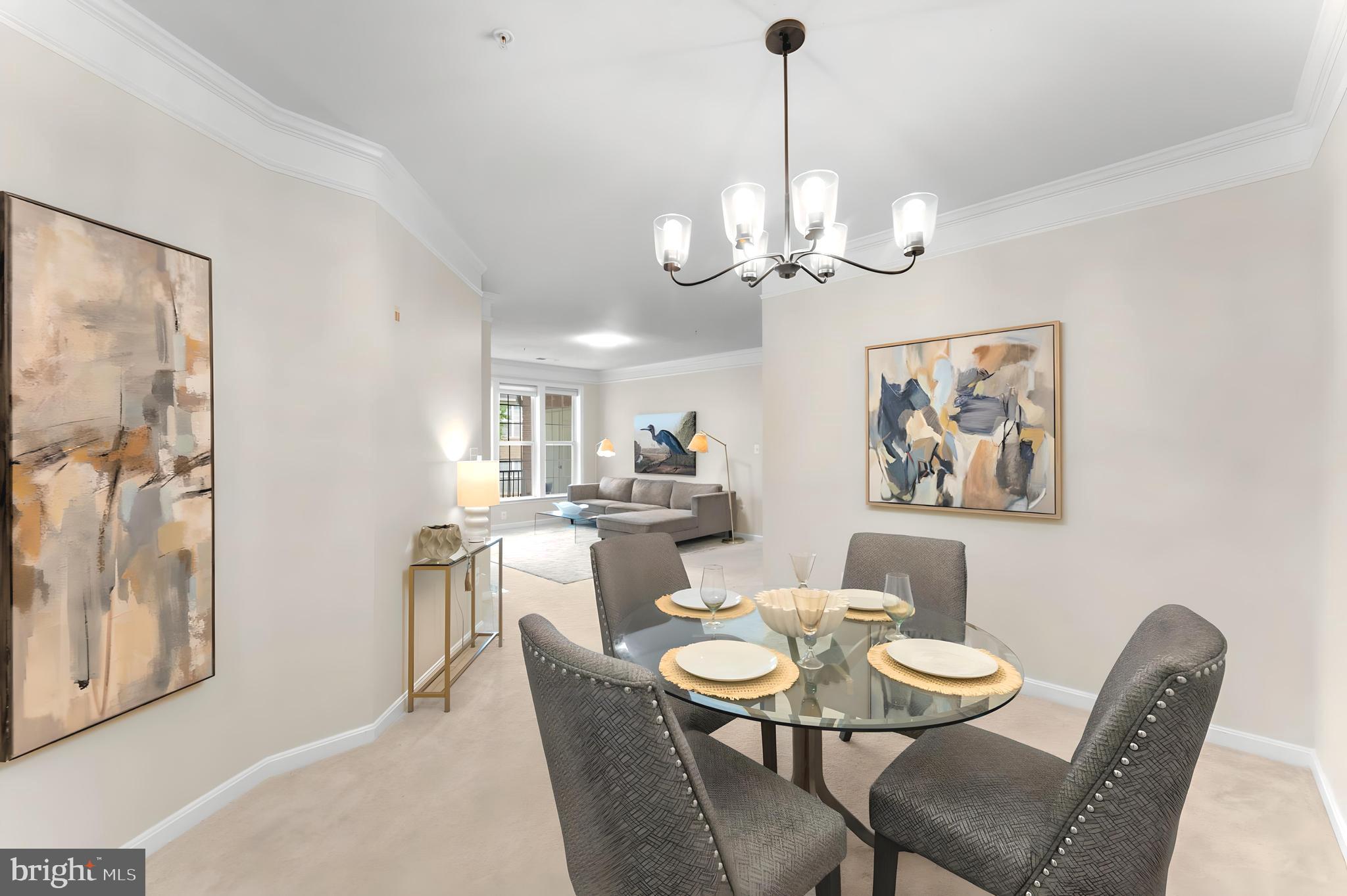 12170 Abington Hall Place, Unit 201 Reston, VA 20190 - Photo 22 of 39 a view of a dining room with furniture window and wooden floor
