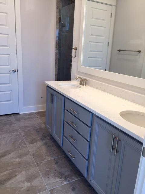 106 York Ln Inlet Beach, Unit C265 Inlet Beach, FL 32461 - Photo 6 of 19 a bathroom with a granite countertop sink and a mirror