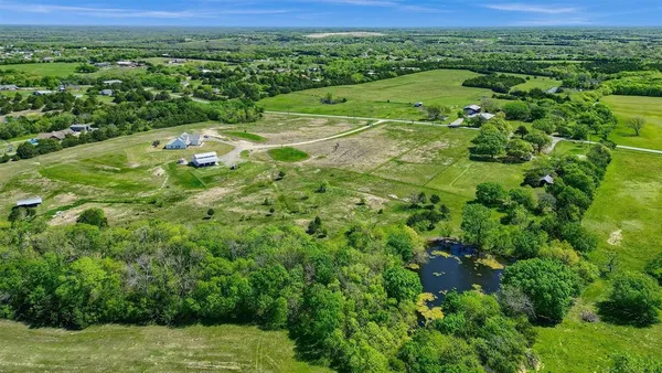 a view of a lush green space