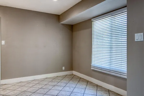 a view of an empty room with window