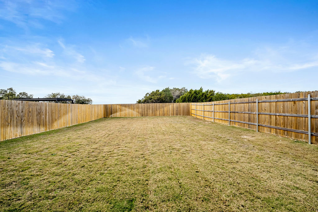 2417 Roosevelt Road Leander, TX 78641 - Photo 36 of 40 View of fenced backyard