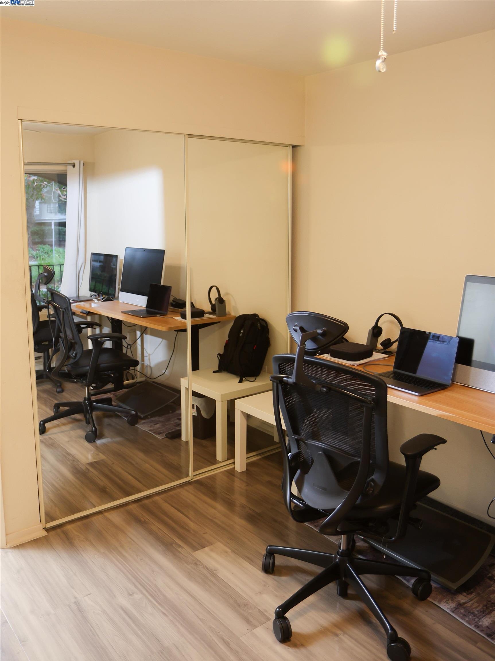 839 Printempo Place San Jose, CA 95134 - Photo 14 of 54 a view of a workspace with furniture and a window