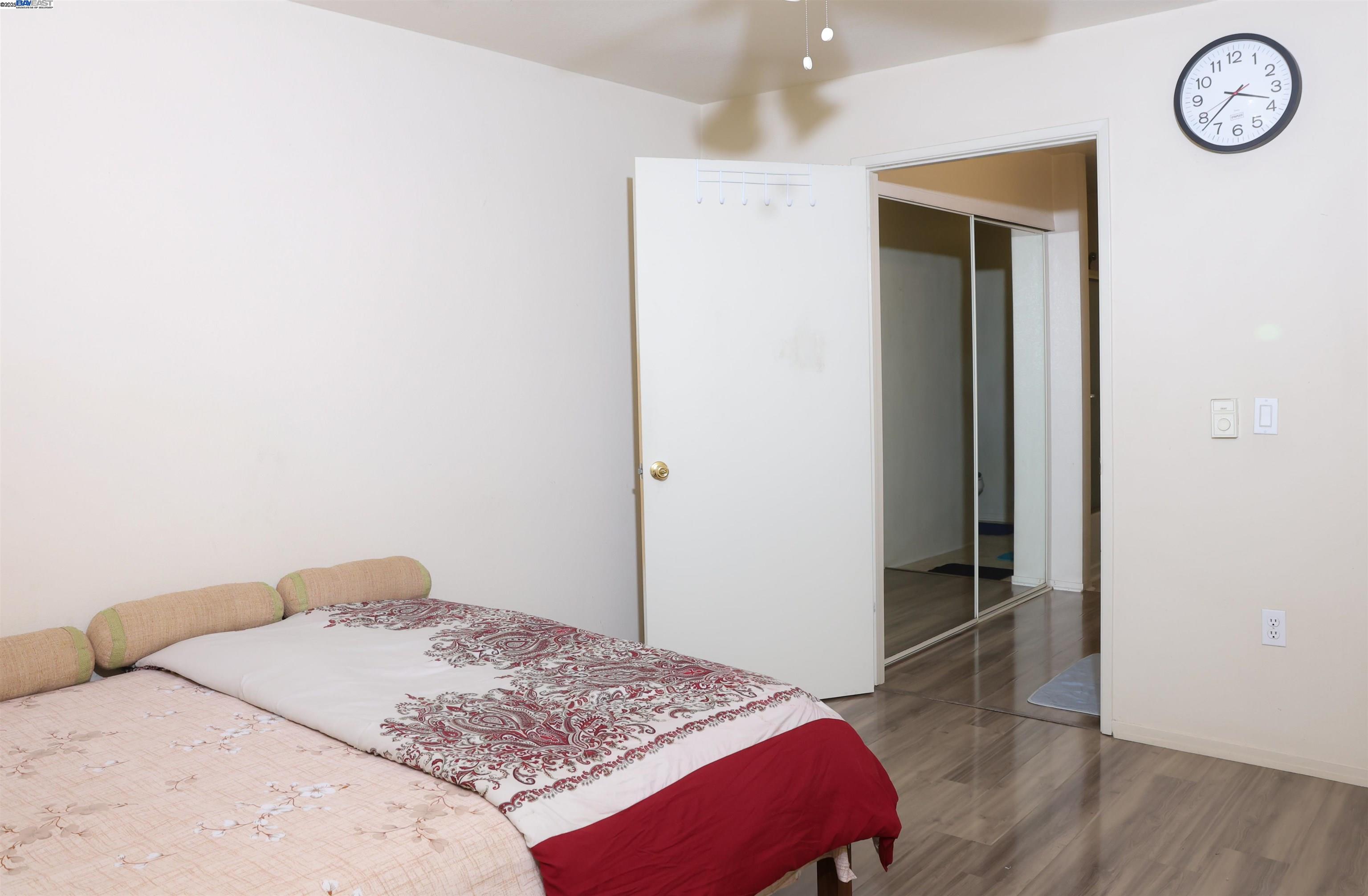 839 Printempo Place San Jose, CA 95134 - Photo 17 of 54 a bedroom with a bed and a table in it