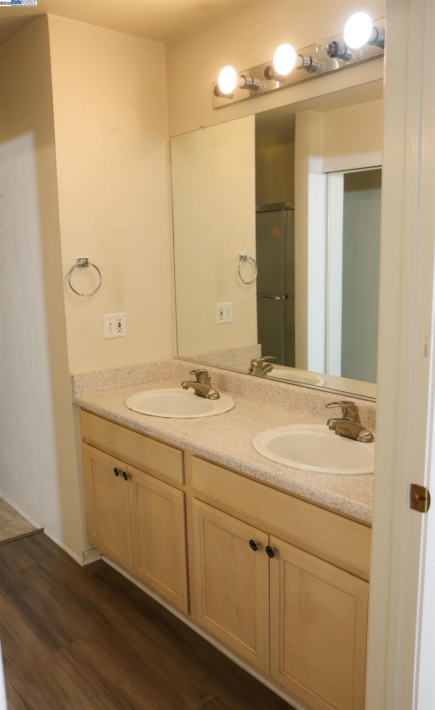 839 Printempo Place San Jose, CA 95134 - Photo 20 of 54 a bathroom with a sink and a mirror