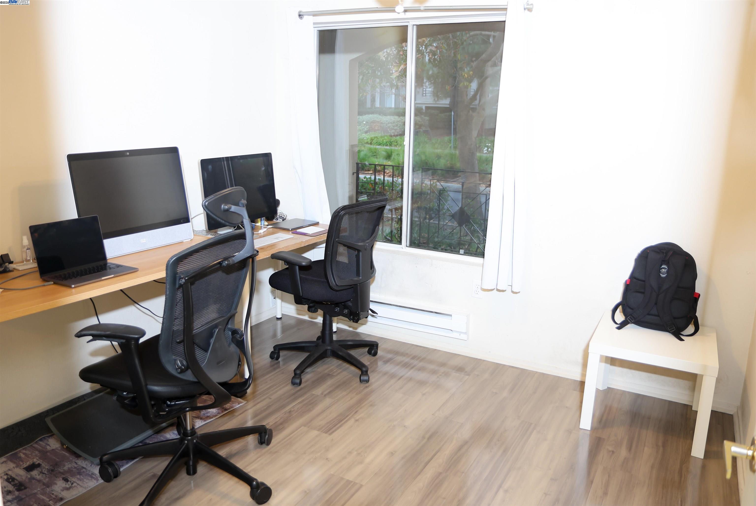 839 Printempo Place San Jose, CA 95134 - Photo 30 of 54 a view of a workspace with furniture and a window