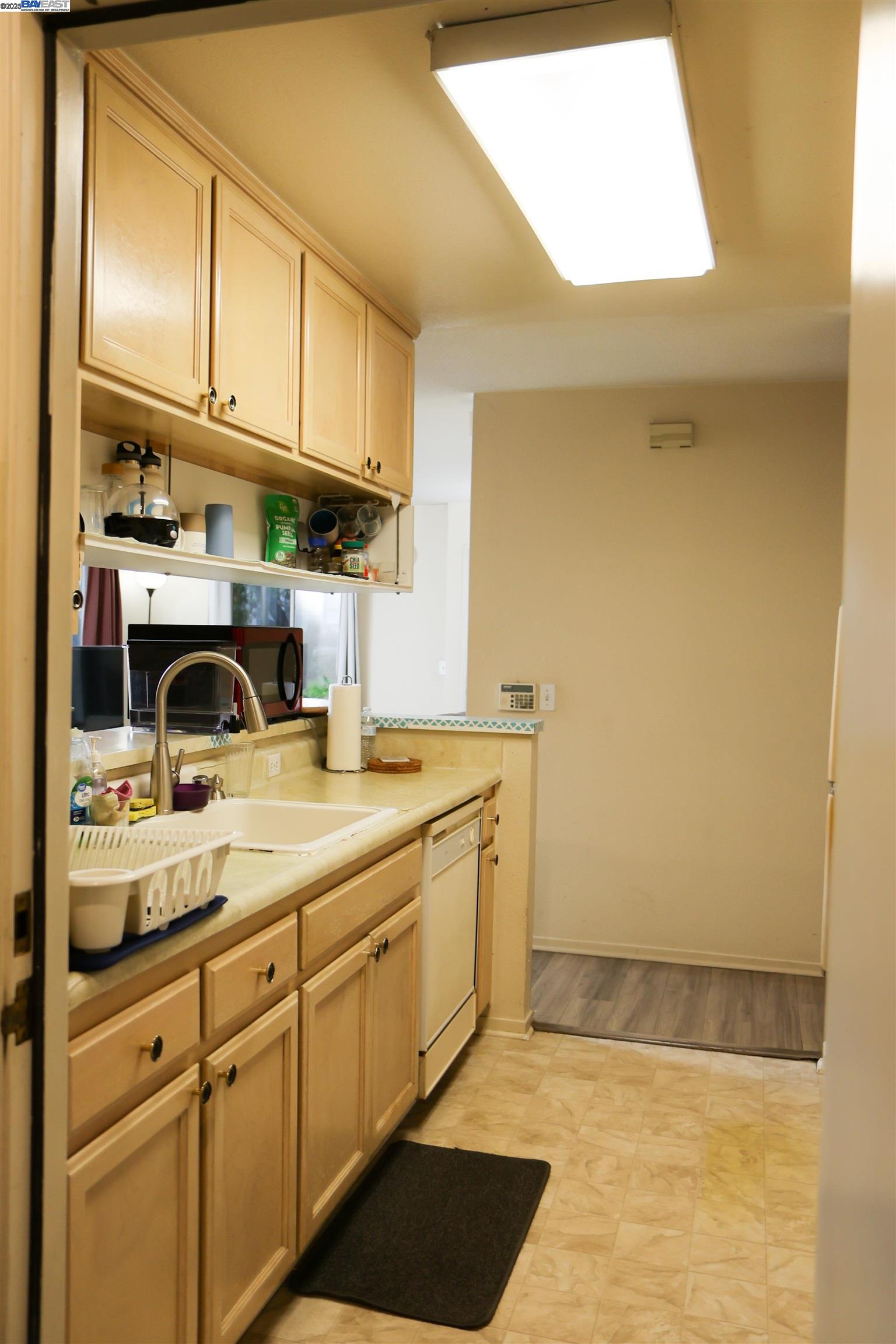 839 Printempo Place San Jose, CA 95134 - Photo 37 of 54 a kitchen with a sink cabinets and appliances
