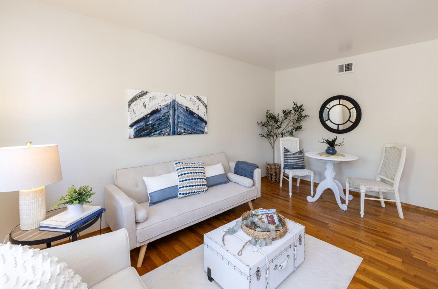 710-712 Riverview Drive Capitola, CA 95010 - Photo 20 of 37 a living room with furniture and a table