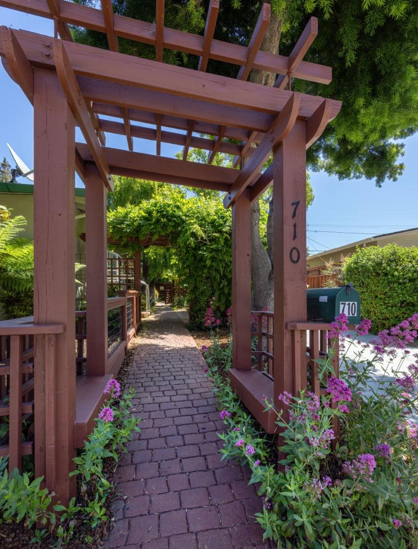 710-712 Riverview Drive Capitola, CA 95010 - Photo 2 of 37 a view of a patio with table and chairs potted plants