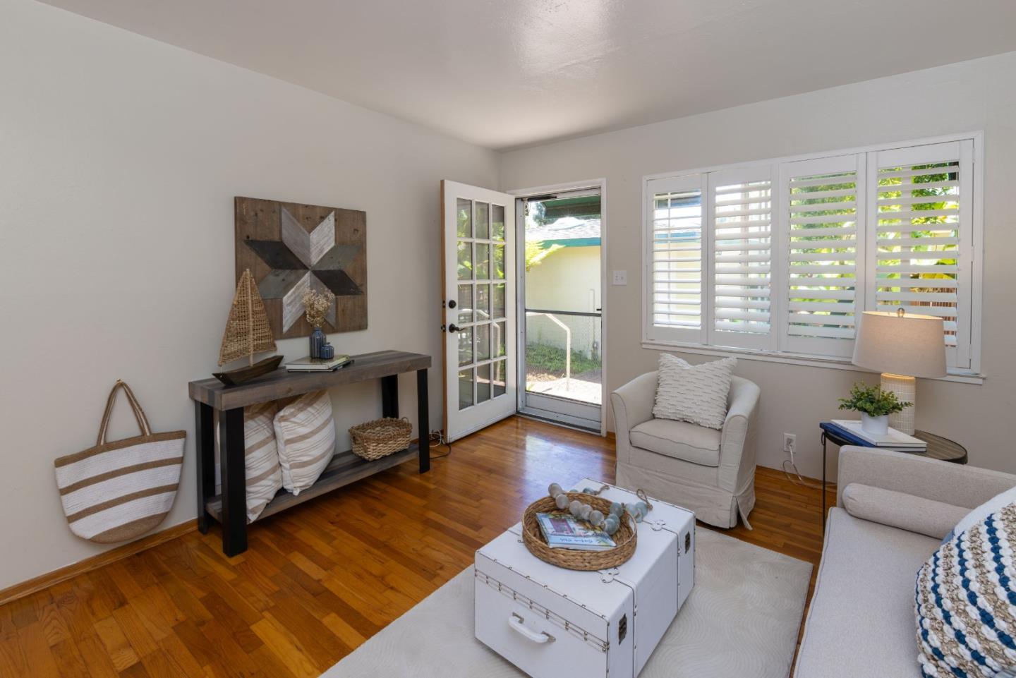 710-712 Riverview Drive Capitola, CA 95010 - Photo 21 of 37 a living room with furniture and a wooden floor
