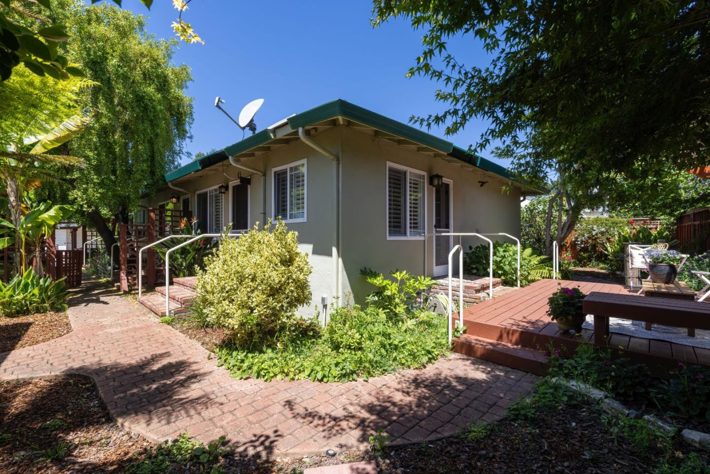 710-712 Riverview Drive Capitola, CA 95010 - Photo 27 of 37 a front view of house with yard and trees around