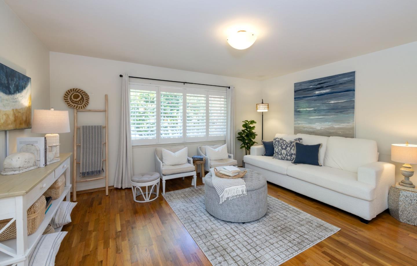 710-712 Riverview Drive Capitola, CA 95010 - Photo 3 of 37 a living room with furniture and a wooden floor
