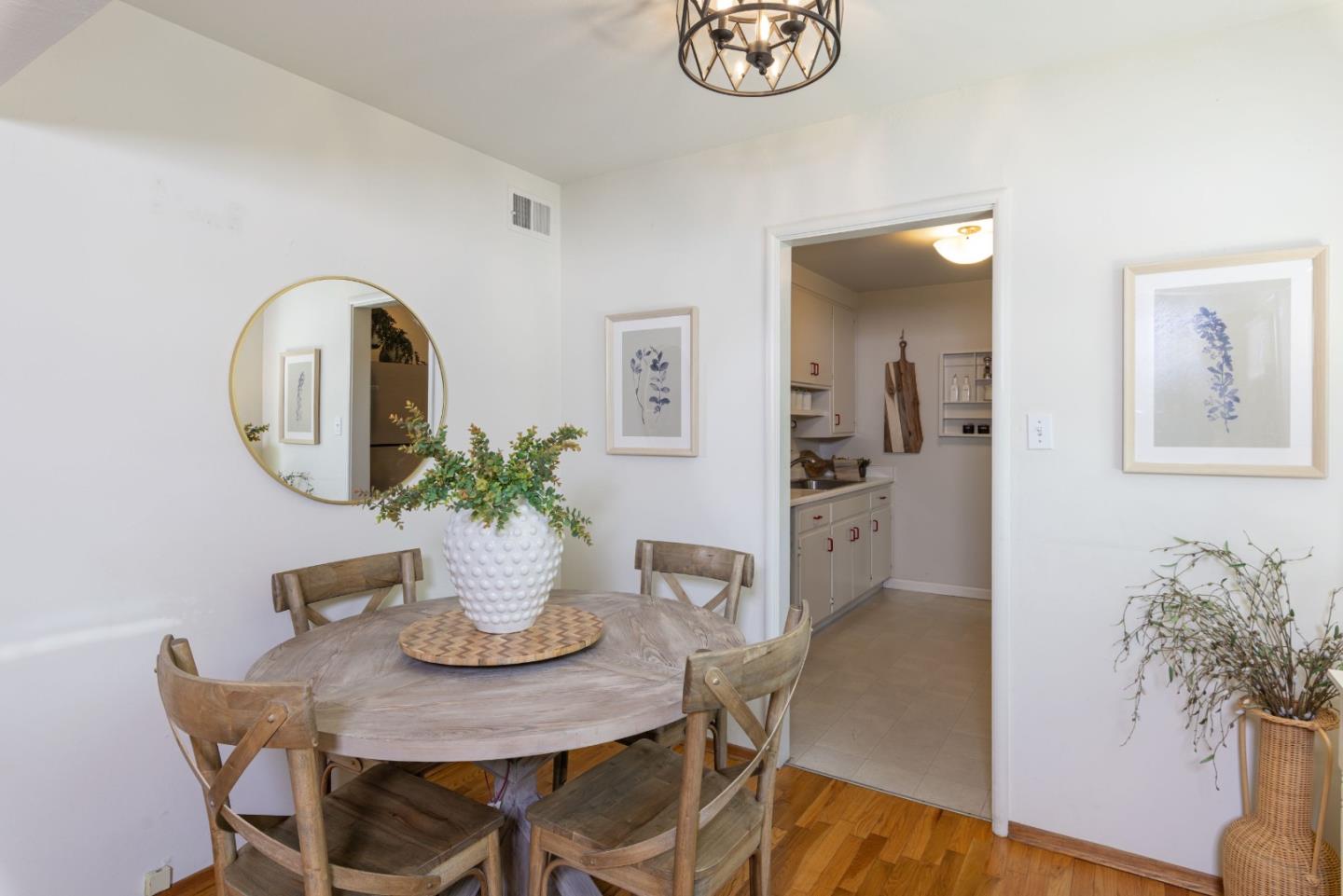710-712 Riverview Drive Capitola, CA 95010 - Photo 6 of 37 a dining room with furniture and potted plant