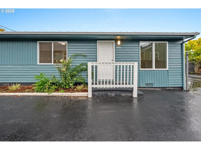 a view of a house with a street