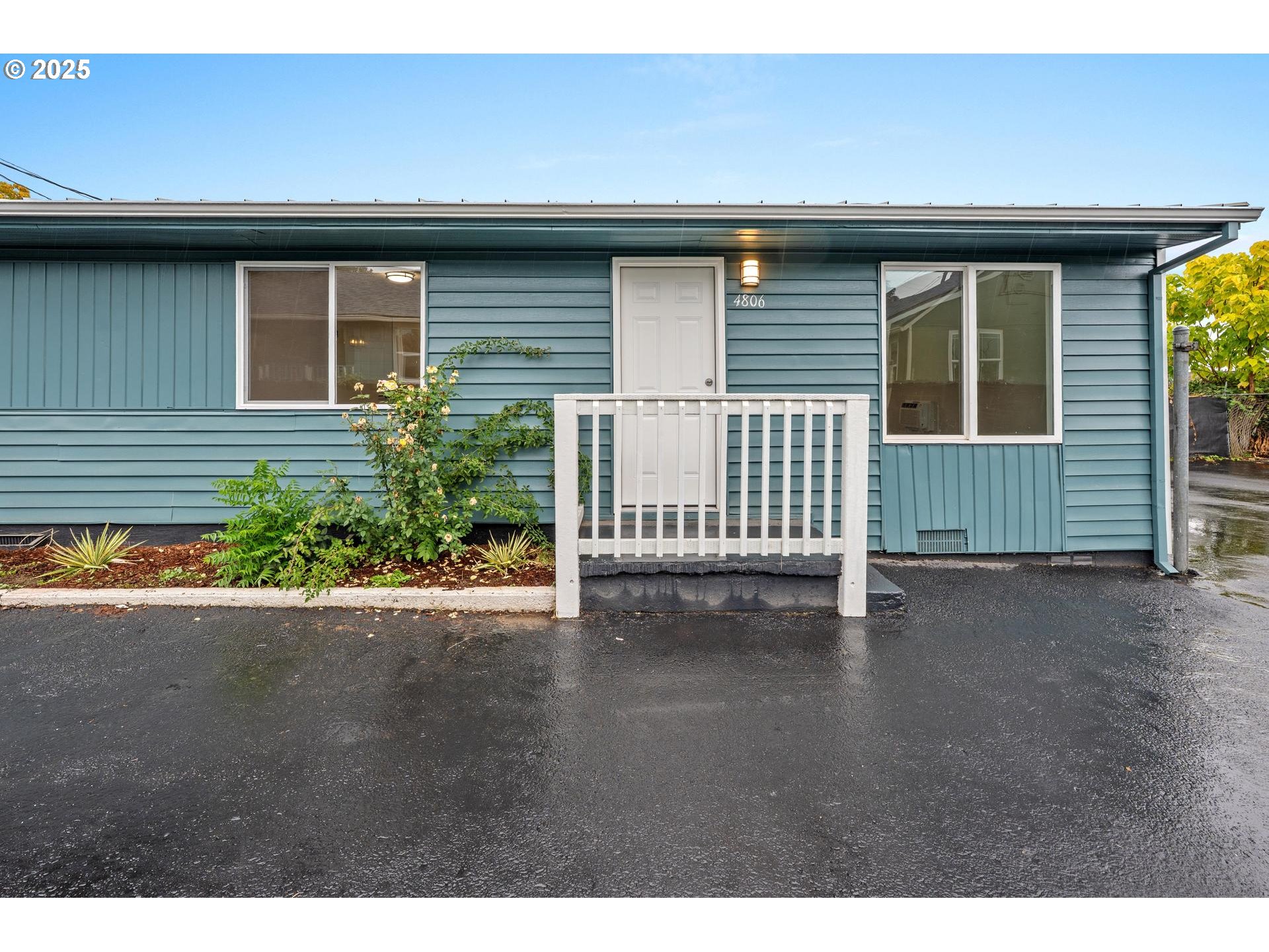 4804-4806 Northeast 111th Avenue Portland, OR 97220 - Photo 18 of 44 a view of a house with a street