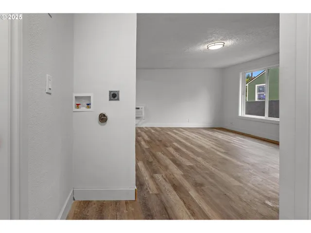 a view of an empty room and window