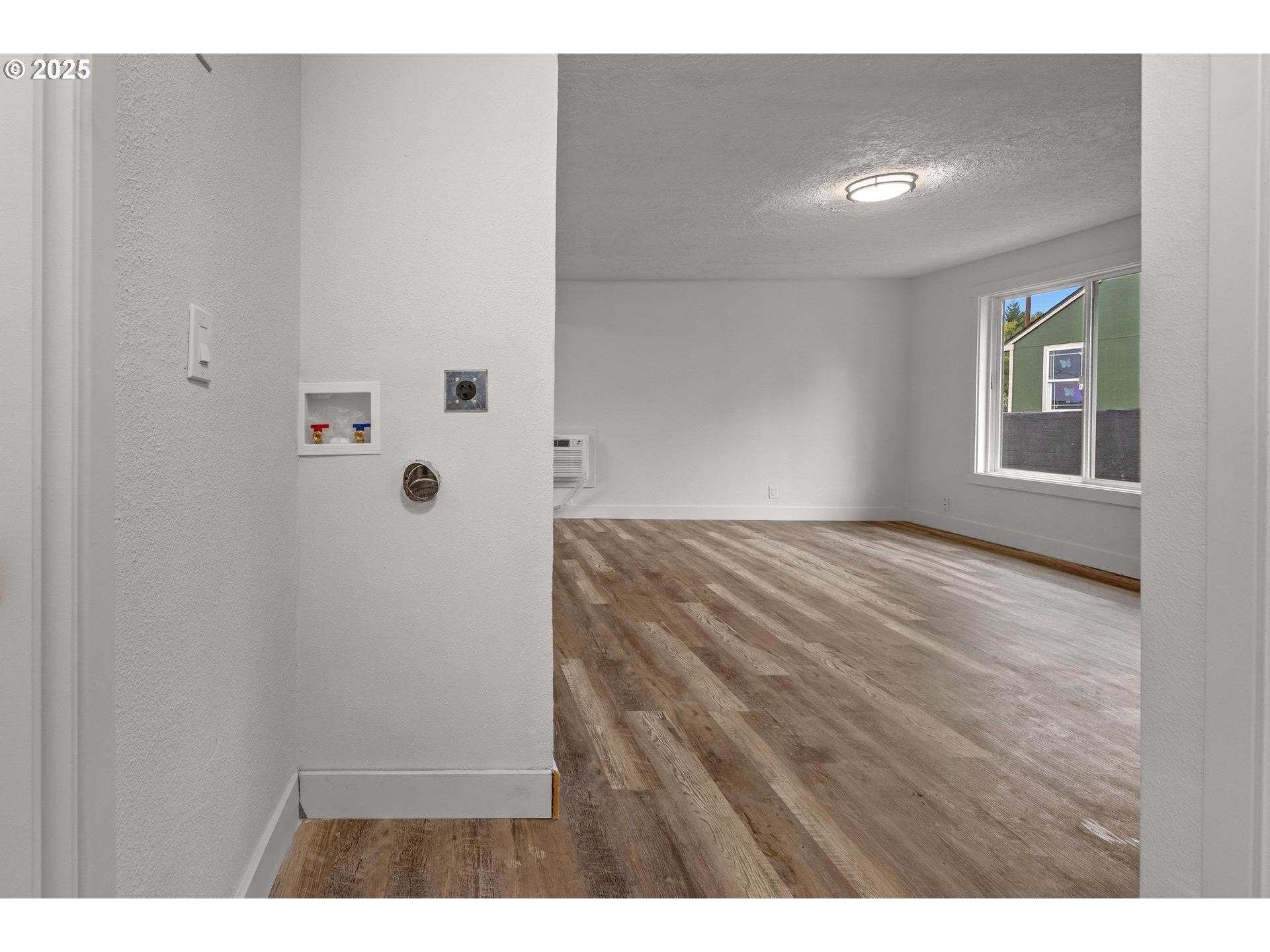 4804-4806 Northeast 111th Avenue Portland, OR 97220 - Photo 28 of 44 a view of an empty room and window