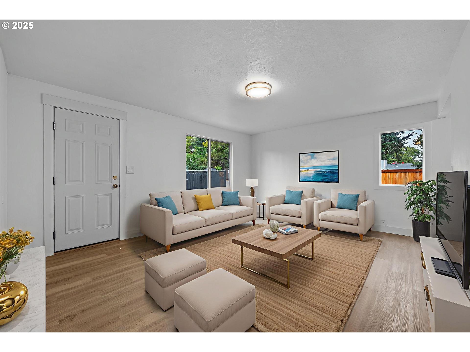 4804-4806 Northeast 111th Avenue Portland, OR 97220 - Photo 5 of 44 a living room with furniture and a wooden floor