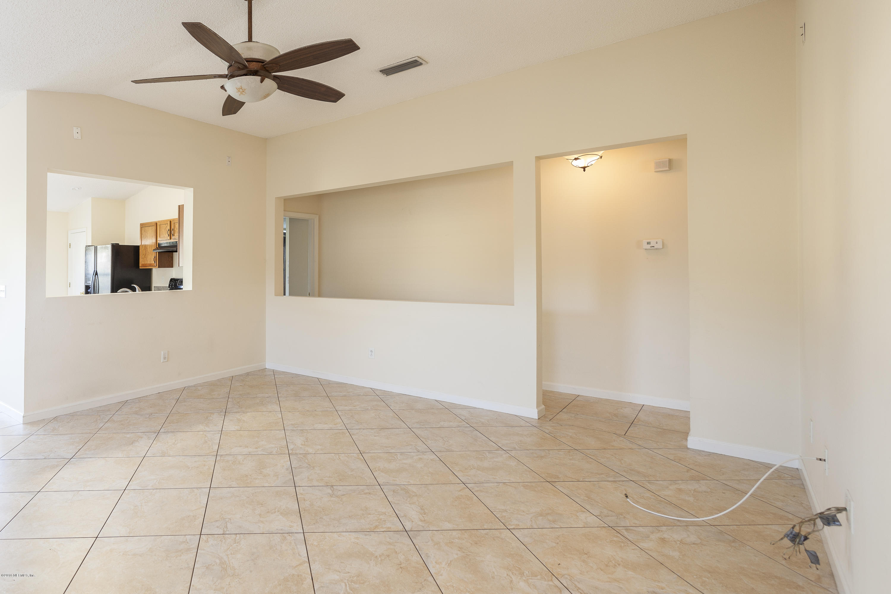 1148 Morning Light Road Jacksonville, FL 32218 - Photo 7 of 28 a view of an empty room