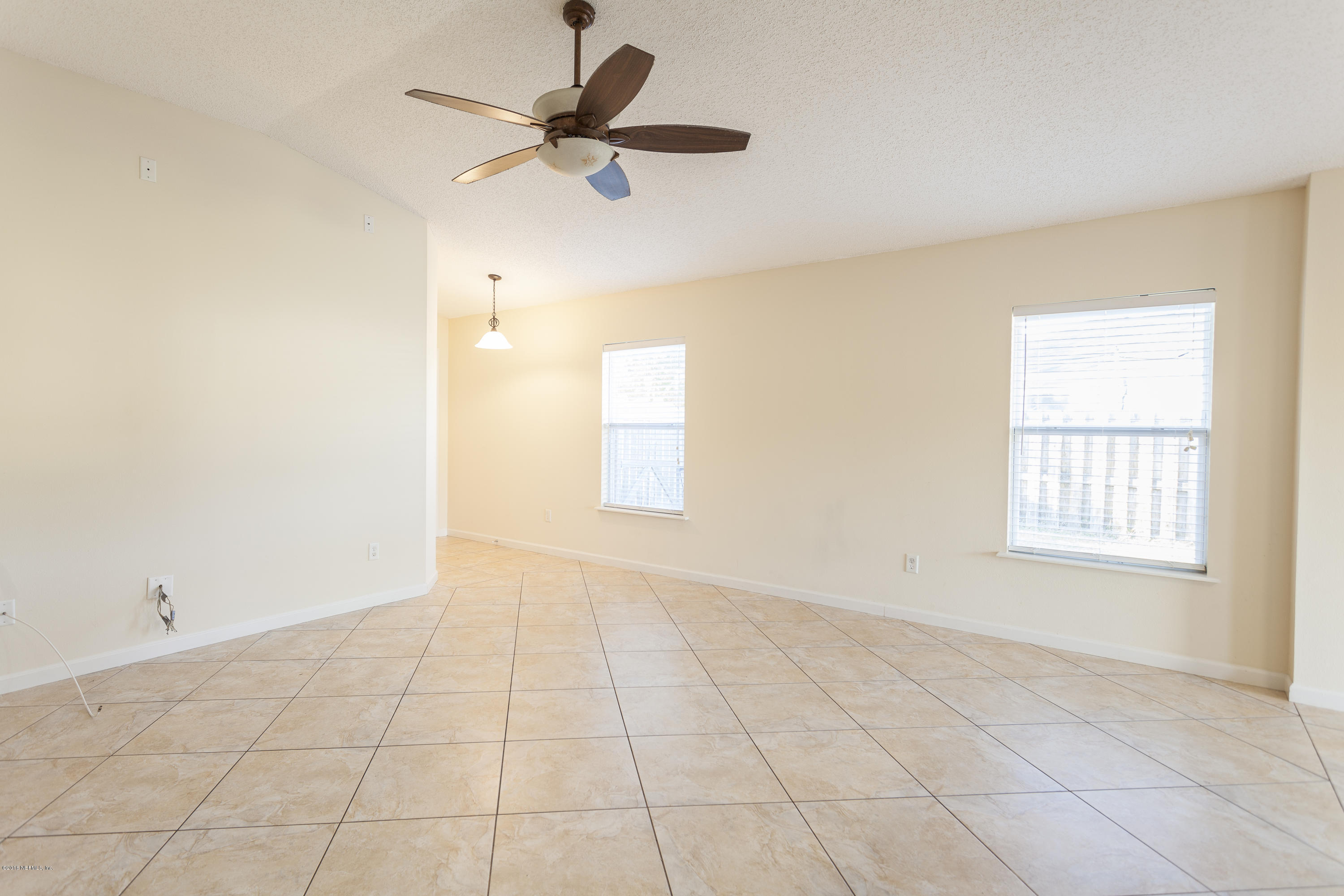 1148 Morning Light Road Jacksonville, FL 32218 - Photo 8 of 28 a view of an empty room with a window
