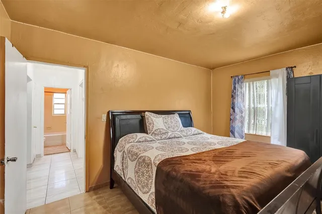 a bathroom with a sink a toilet and bathtub