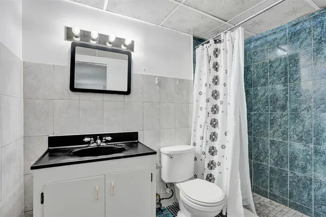 a bathroom with a sink and a vanity