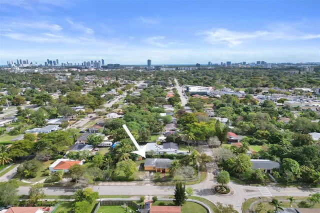 an aerial view of a city with lots of residential buildings
