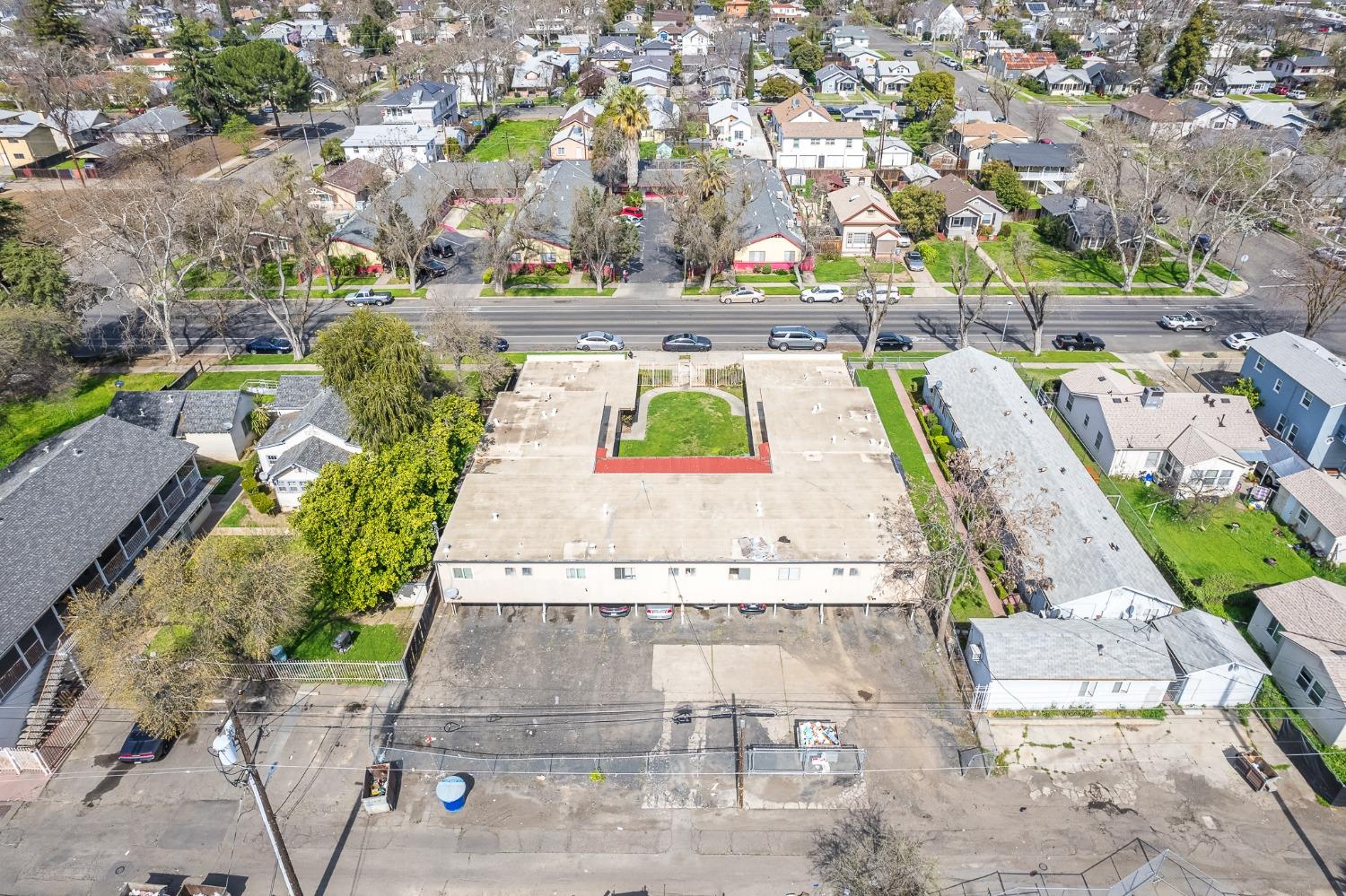 132 West 18th Street Merced, CA 95340 - Photo 17 of 23 a view of swimming pool with a yard