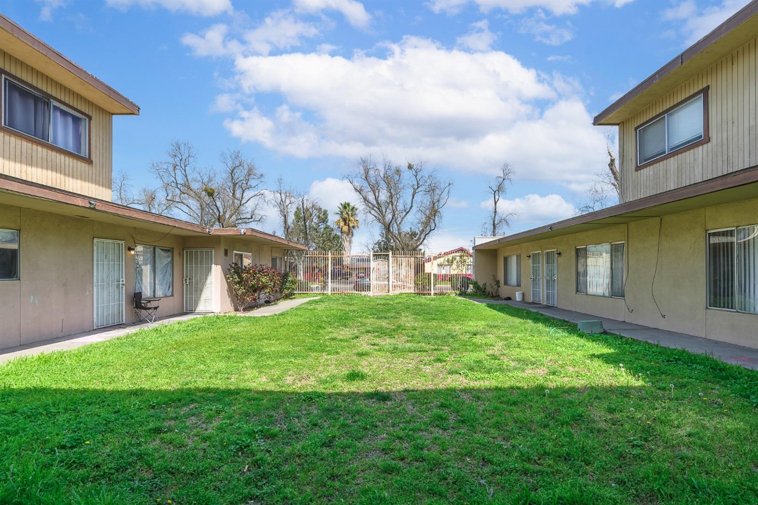 132 West 18th Street Merced, CA 95340 - Photo 7 of 23 a view of a yard in front of house