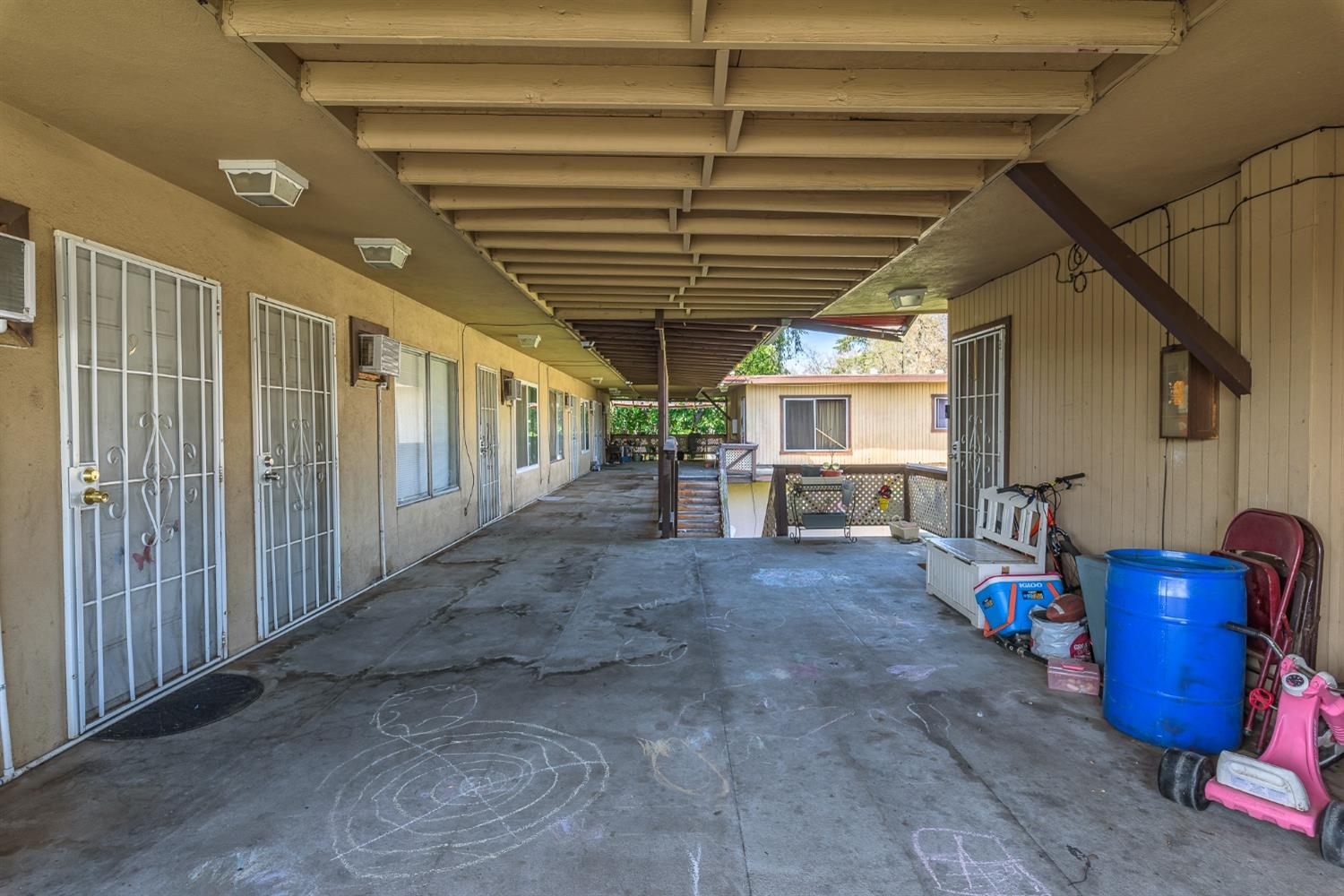 132 West 18th Street Merced, CA 95340 - Photo 10 of 23 a view of a porch with furniture and a backyard