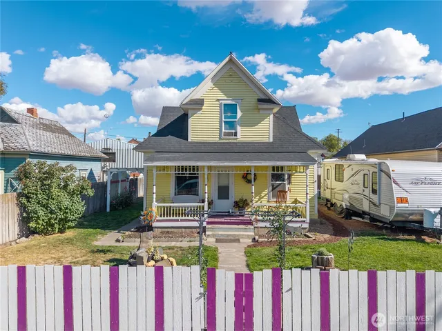 a front view of a house with a porch