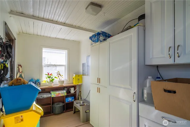 a room with furniture and a window