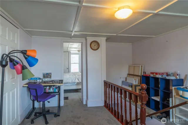 a view of a hallway with workspace